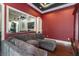 Cozy media room with a sectional sofa and projector at 6357 Ashley Dr, Lakeland, FL 33813