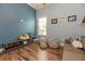 Bright playroom featuring stylish beanbag chairs, wooden floors, and a cozy couch with accent pillows at 6357 Ashley Dr, Lakeland, FL 33813
