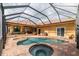 An aerial view of the luxurious pool and spa area, perfect for outdoor relaxation at 6357 Ashley Dr, Lakeland, FL 33813