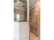 Tiled shower with glass enclosure and a showerhead at 6357 Ashley Dr, Lakeland, FL 33813