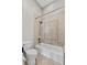 Bright bathroom featuring white toilet and a tiled bathtub shower combination with a shower head at 6542 Eagle Ridge Way, Lakeland, FL 33813