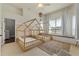 Bright bedroom with two house frame toddler beds, a rug, and a window seat at 6542 Eagle Ridge Way, Lakeland, FL 33813
