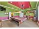 View of game room with a bar, barstools, pool table, and a door to the outside at 6542 Eagle Ridge Way, Lakeland, FL 33813