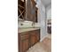 Kitchen with wine rack, granite countertops, and decorative tile backsplash at 6542 Eagle Ridge Way, Lakeland, FL 33813