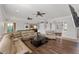 Large living room featuring an open floor plan, neutral paint, and lots of seating at 6542 Eagle Ridge Way, Lakeland, FL 33813