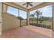 A beautiful outdoor patio with neutral tones and a view of the golf course at 6542 Eagle Ridge Way, Lakeland, FL 33813