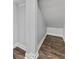 Unfinished storage area with hardwood-style flooring and neutral paint at 6542 Eagle Ridge Way, Lakeland, FL 33813