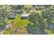 Aerial view of residential neighborhood with well-manicured lawns and mature trees at 6543 Tula Ln, Lakeland, FL 33809