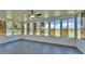 Enclosed sunroom offering a bright and airy space with views of the surrounding landscape at 6543 Tula Ln, Lakeland, FL 33809