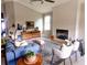 Comfortable living room featuring a shiplap fireplace, modern furnishings, and lots of natural light at 7919 Lake James Blvd, Lakeland, FL 33810