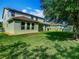 Expansive backyard with lush green lawn and privacy fence at 13525 Gorgona Isle Dr, Windermere, FL 34786