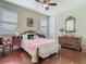 Well-lit bedroom with hardwood floors and window blinds at 13525 Gorgona Isle Dr, Windermere, FL 34786