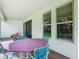 Outdoor patio featuring brick flooring, comfortable seating and a lovely view of the backyard at 13525 Gorgona Isle Dr, Windermere, FL 34786
