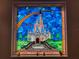 Beautiful, custom stained glass window featuring Cinderella's castle design at 13525 Gorgona Isle Dr, Windermere, FL 34786