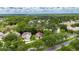 Aerial view showing the location in a neighborhood with lush landscaping and nearby amenities at 1003 Clearpointe Way, Lakeland, FL 33813