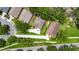 Aerial view of home showing boundary lines, landscaping, long driveway, and nearby houses at 1003 Clearpointe Way, Lakeland, FL 33813
