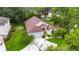 Aerial view of a single-Gathering home showing roof details, landscaping, and a spacious driveway at 1003 Clearpointe Way, Lakeland, FL 33813