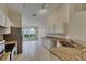 Kitchen with stainless steel appliances, granite countertops, and natural light at 1003 Clearpointe Way, Lakeland, FL 33813