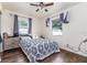 Comfortable bedroom with hardwood floors and natural light at 102 Pike St, Auburndale, FL 33823