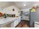 Open-concept kitchen featuring counterspace and views to the rest of the home at 102 Pike St, Auburndale, FL 33823