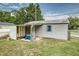 A storage shed offers space for tools and equipment, enhancing the property's functionality at 102 Pike St, Auburndale, FL 33823