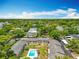 Beautiful aerial view of the community, surrounded by lush greenery and mature trees at 110 N Tremain St # 206, Mount Dora, FL 32757