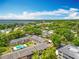 Stunning aerial view of the community, showcasing its prime location near the water at 110 N Tremain St # 206, Mount Dora, FL 32757