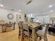 Living room with a dining room, built in shelves, and lots of natural light at 110 N Tremain St # 206, Mount Dora, FL 32757