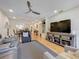 Spacious living room with lots of natural light, open concept design, with modern furniture at 110 N Tremain St # 206, Mount Dora, FL 32757