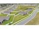 An aerial view of a single-Gathering home shows well-manicured lawns and white fenced yards in a residential neighborhood at 1146 Enclave Ct., Auburndale, FL 33823