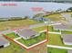Aerial view highlights the property's location near Lake Arietta and community boat launch at 1146 Enclave Ct., Auburndale, FL 33823