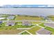 The aerial view showcases the home's location and surrounding scenery near the lake at 1146 Enclave Ct., Auburndale, FL 33823