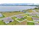 The aerial view highlights the property's desirable location with lake views and community access at 1146 Enclave Ct., Auburndale, FL 33823