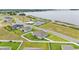 The aerial view emphasizes the property's location near the lake and surrounding community at 1146 Enclave Ct., Auburndale, FL 33823