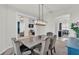Open-concept dining room that leads to the living and kitchen areas at 1146 Enclave Ct., Auburndale, FL 33823