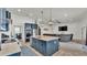 Open-concept kitchen featuring an island that opens to the living room at 1146 Enclave Ct., Auburndale, FL 33823