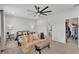 Serene main bedroom featuring a seating area and an ensuite bathroom and walk-in closet at 1146 Enclave Ct., Auburndale, FL 33823