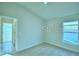 Picture of bedroom, with light colored walls, and one window at 1529 Leamington Ln, Winter Haven, FL 33884