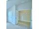 Spacious closet with double doors and plenty of storage space for clothing and accessories at 1529 Leamington Ln, Winter Haven, FL 33884