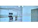 Modern kitchen featuring stainless steel appliances, sleek cabinets, and ample counter space at 1529 Leamington Ln, Winter Haven, FL 33884