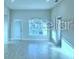 Expansive living room boasts plenty of natural light, enhancing the home's inviting ambiance at 1529 Leamington Ln, Winter Haven, FL 33884