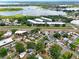 Aerial view of the property's location, close to a lake and various commercial establishments at 1648 Skinner St, Lakeland, FL 33801