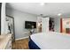 Main bedroom with wood-look flooring, a closet, and a serene, inviting atmosphere at 1648 Skinner St, Lakeland, FL 33801