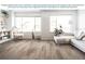 Spacious living room showcasing the vinyl plank flooring provided by the manufacturer at 1819 Daystar Dr, Haines City, FL 33844