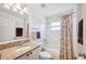 Bright bathroom featuring a bathtub with shower and neutral decor at 188 Morning Dew Ct, Winter Haven, FL 33884