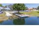 Community dock featuring boat access and an entertaining area for guests and residents alike at 188 Morning Dew Ct, Winter Haven, FL 33884