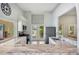 Bright kitchen with granite countertops, stainless steel appliances, and views to the outdoors at 188 Morning Dew Ct, Winter Haven, FL 33884