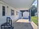 A view of the long carport with the shed at the end at 2005 Blue Lake Dr, Lakeland, FL 33801