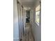 Hallway with hardwood floors leading to a bedroom at 2005 Blue Lake Dr, Lakeland, FL 33801