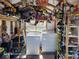 Practical laundry area with washer, dryer, and storage shelves, maximizing space and functionality at 2005 Blue Lake Dr, Lakeland, FL 33801